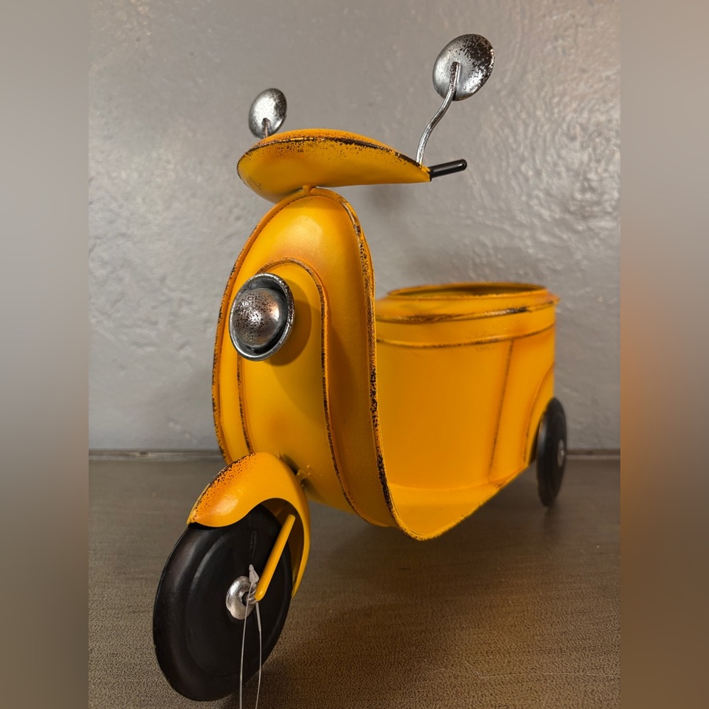 Vintage looking yellow Metal Scooter Garden
Planter (YELLOW ONE)